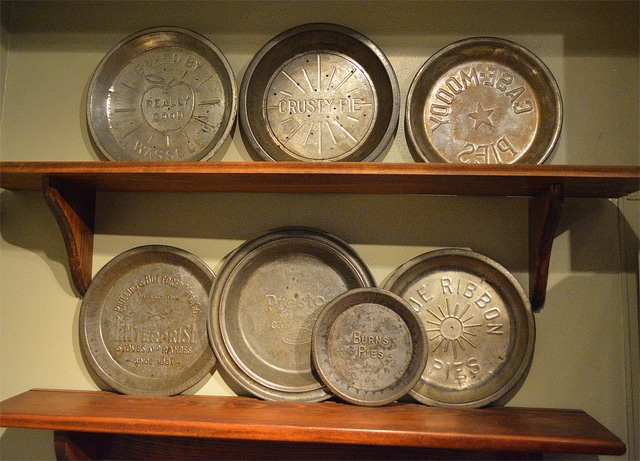 Kathy Levo shows off her unique pie pan collection
